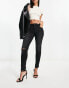 Pimkie skinny jeans with rips in black