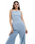 ASOS DESIGN soft denim tie back jumpsuit in mid blue