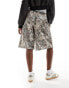 COLLUSION relaxed long sweat shorts in woodland camo