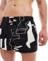 ASOS DESIGN swim shorts in super short length in black print