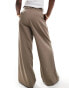 Stradivarius super wide leg pleat front trousers in beige