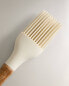 Silicone and wood brush