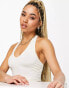 ASOS DESIGN halter neck crop top in cream