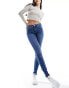 Vero Moda Alia mid rise skinny jeans with bum sculpt detail in medium blue