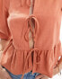 ASOS DESIGN linen blend tie front peplum tie front blouse in rust