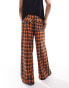 COLLUSION Unisex check wide leg trousers in orange