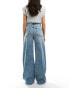 ASOS DESIGN wide leg jean with pleat detail in lightwash