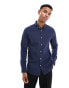 ASOS DESIGN slim shirt with button down collar in navy polka dot