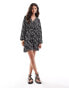 Vila wrap mini dress with tie waist in black animal print