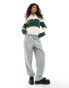 Lioness knitted rugby jumper in cream and dark green stripe