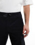 Jack & Jones tapered cuffed cargo trousers in black