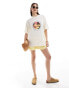 ASOS DESIGN oversized t-shirt with paradise island beer drink graphic in cream