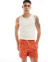 Another Influence swim shorts in orange sunny geo print