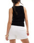 In The Style exclusive wrap front skort in white