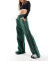 Nike Streetwear oversized fleece wide leg jogger in dark green