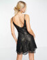 Topshop lace flippy mini slip dress with gold metallic lining in black