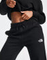 The North Face Essential oversized joggers in black Exclusive at ASOS