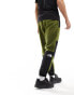 The North Face NSE Fleeski fleece joggers in olive