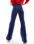 & Other Stories high rise flared jeans with patch pockets in dark blue wash