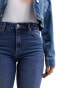 Bershka high waisted split hem jeans in mid blue