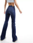 Tommy Jeans sylvia high waist flared jeans in mid wash