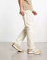 PacSun – Locker geschnittene Jeans in Beige mit Patchwork-Design