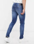 Tommy Jeans austin slim tapered jeans in mid wash