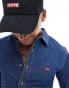 Levi's Battery batwing logo slim fit chambray denim shirt in mid blue