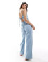 ASOS DESIGN soft denim tie back jumpsuit in mid blue