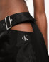 Calvin Klein Jeans cut out shiny mini skirt in black