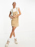 Tommy Jeans logo corduroy pinafore dress in sand