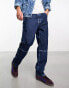 Tommy Jeans skater worker jeans in mid wash