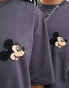 ASOS DESIGN Disney unisex oversized tee in charcoal with Mickey Mouse chest print