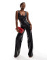 ASOS DESIGN leather look plunge wide leg jumpsuit in black