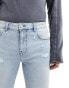 ASOS DESIGN skinny jeans with rips in light blue tinted wash