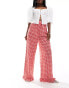 ASOS DESIGN gingham trousers with frill hem in red