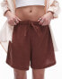 Topshop casual crinkle drawstring shorts in rust