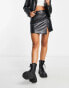 Reclaimed Vintage leather look mini skirt in black with hardware detail