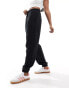 Monki joggers with cuffed hem in black