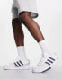 adidas Originals Courtic trainers in white and navy