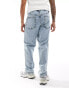 ASOS DESIGN baggy fit jeans in light wash blue with heavy acid wash