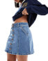 Wrangler denim mini skirt in mid wash