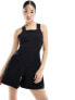 Edited cross back pinafore playsuit in black