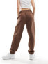 New Balance Linear heritage brushed back fleece sweatpant in brown