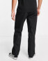 Vans authentic loose fit chino trousers in black