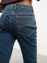 COLLUSION x007 mid rise bootleg jeans in dirty wash