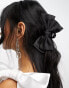 True Decadence bow hair claw in black