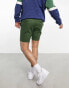 ASOS DESIGN skinny shorts in mid length in khaki