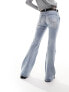 Weekday Flame low waist flared jeans in stone blue