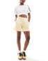 adidas Originals essentials jersey shorts in pale yellow